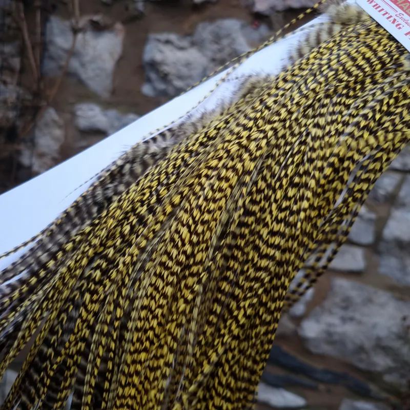 Whiting 1/2 Bronze Grade Dry Fly Rooster Saddle in Grizzly Pale Yellow